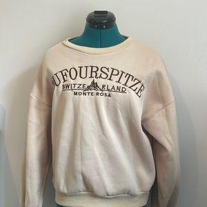 cream colored crew neck